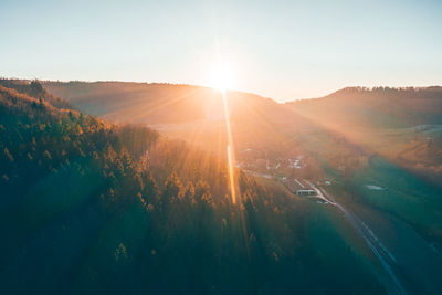 Scenic view of landscape against sky during sunset