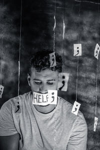 Portrait of young man with text