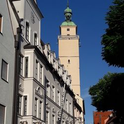 Low angle view of clock tower against sky