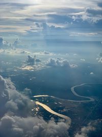 Aerial view of cloudscape over landscape