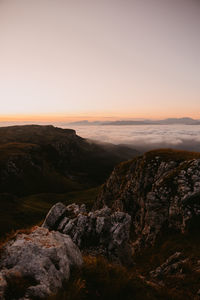 Scenic view of landscape against sky during sunset