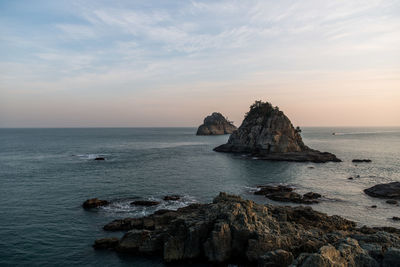 Scenic view of sea against sky during sunset