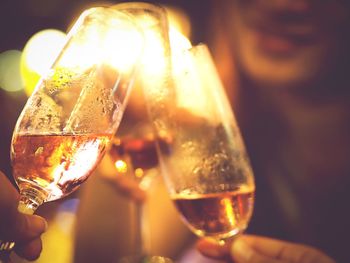 Close-up of hand holding wineglass