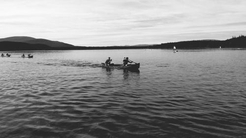 People on boat in sea