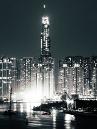 Illuminated buildings in city at night