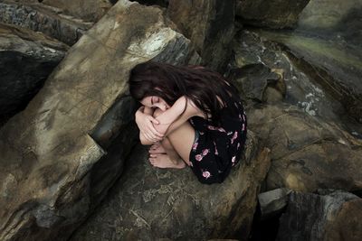 High angle view of woman on rock formation