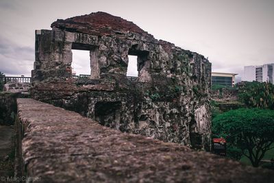 Low angle view of old building against sky