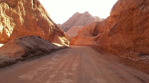 Road leading towards mountains