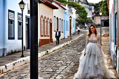 Bride walking on street