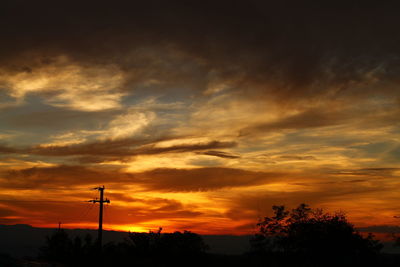 Low angle view of cloudy sky during sunset