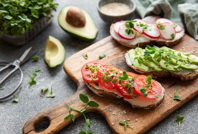 Different sandwiches with vegetables and microgreens. healthy food