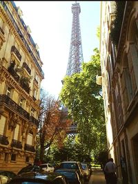 Low angle view of city street against sky