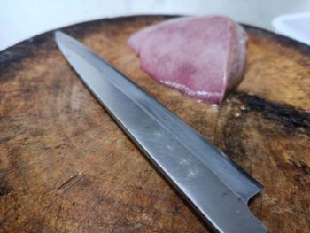 High angle view of chopped bread on cutting board