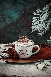 Close-up of coffee cup on table