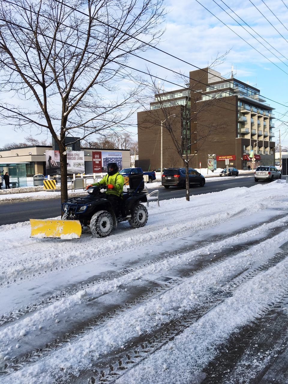 CARS ON SNOW IN CITY