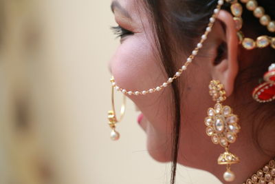 Close-up of bride wearing jewelry