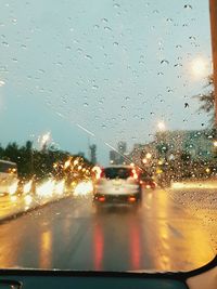 Road seen through car windshield