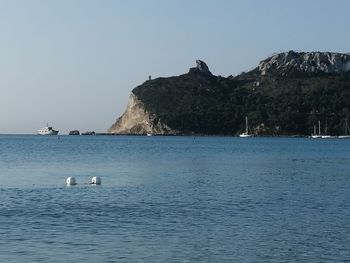 Scenic view of sea against clear sky