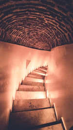 Low angle view of spiral staircase in building