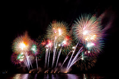 Firework display at night