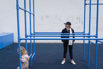 Full length of woman on railing