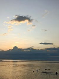 Scenic view of beach against sky during sunset