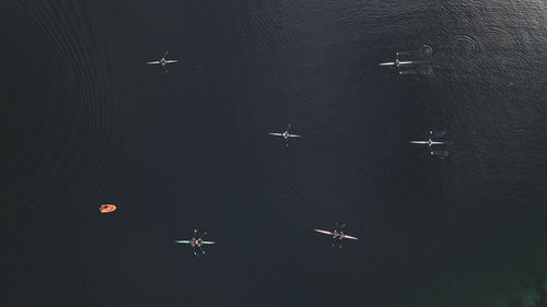 High angle view of airplane flying in sky