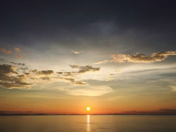 View of calm sea at sunset