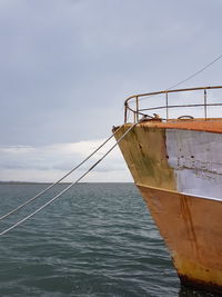 Ship on sea against sky