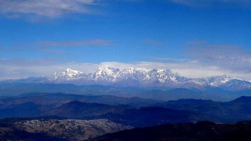 Scenic view of mountains against sky