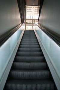 Low angle view of escalator in building