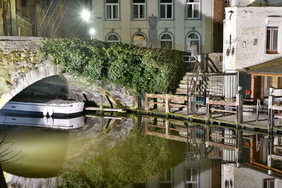 Reflection of illuminated buildings in canal