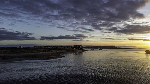 Scenic view of sea against sky during sunset