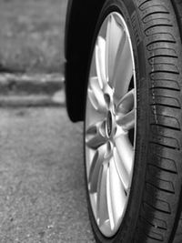 Close-up of bicycle on street