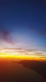 Scenic view of dramatic sky during sunset