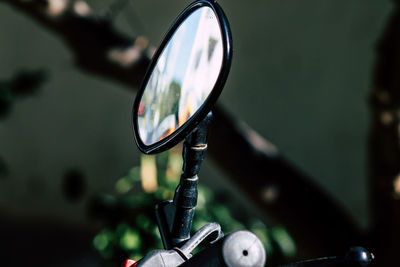 Close-up of motorcycle side-view mirror