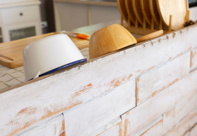 Close up and selective focus shot of minimal style kitchen with wooden plates, kitchen 