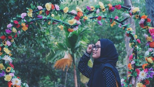 A smiling girl in a park