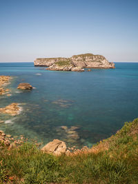 Scenic view of sea against clear sky