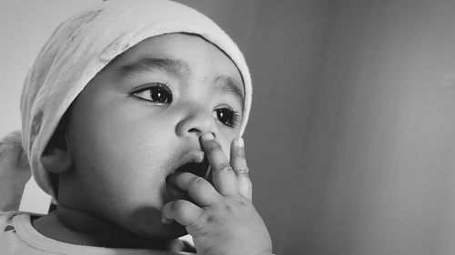 Portrait of cute boy looking away