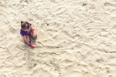 High angle view of girl on beach