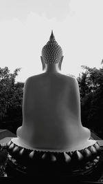 Low angle view of statue against sky