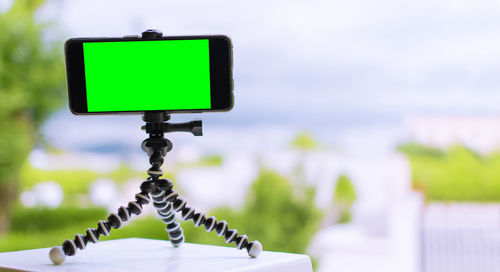 Close-up of telephone pole on table
