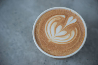 High angle view of cappuccino on table