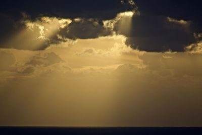 Scenic view of sea against sky at sunset