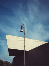 Low angle view of street light against sky