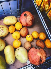 High angle view of apples in market for sale