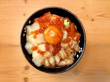 High angle view of fruit salad in bowl on table