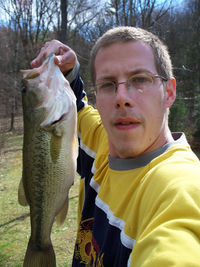 Portrait of man holding fish