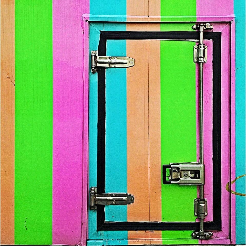 multi colored, green color, blue, built structure, wood - material, door, protection, no people, metal, architecture, close-up, safety, building exterior, colorful, yellow, day, outdoors, closed, security, wall - building feature